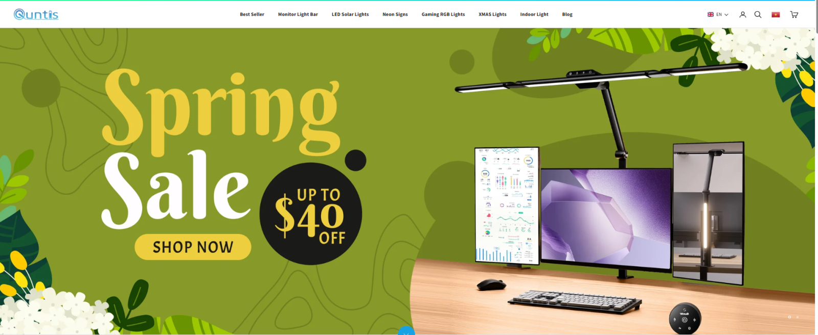 Quntis homepage banner showing spring sale and monitor light bar setup