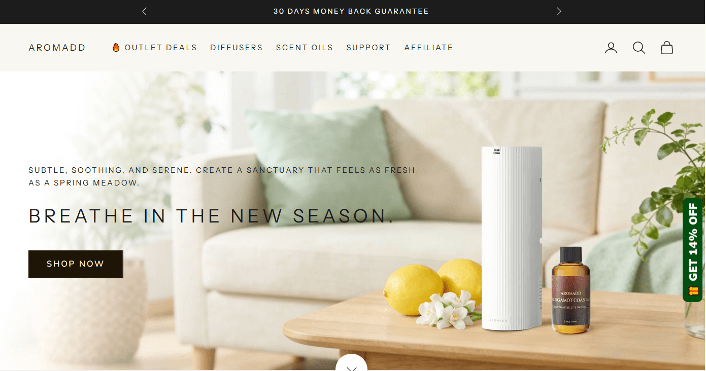 Aromadd homepage showing diffuser and scent oil hero banner with category navigation and money back guarantee