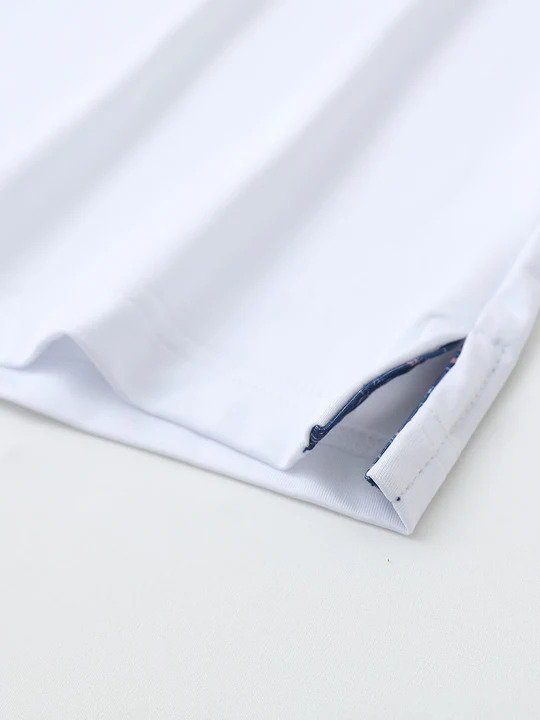 Hem detail on DTWOOO Solid Performance Polo in White