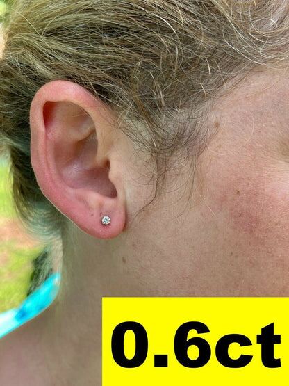 Harlembling 0.6ct moissanite solitaire stud worn on the ear