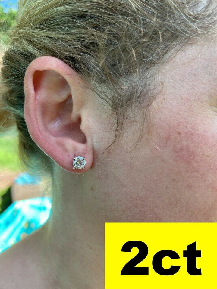 Harlembling 2ct moissanite solitaire stud worn on the ear