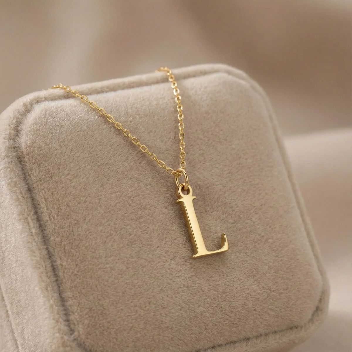 Gold L initial necklace display close-up thumbnail