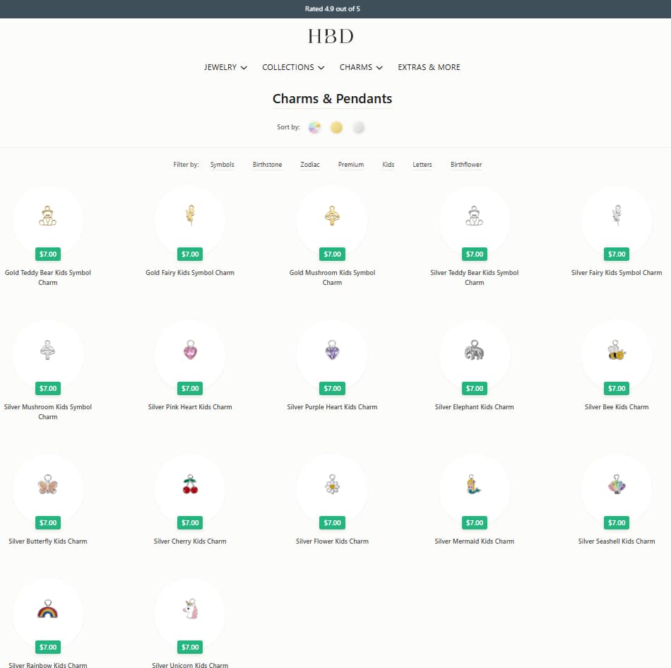 HBD Kids charms page showing teddy bear, fairy, mushroom, heart, butterfly, cherry and other children’s charm add-ons