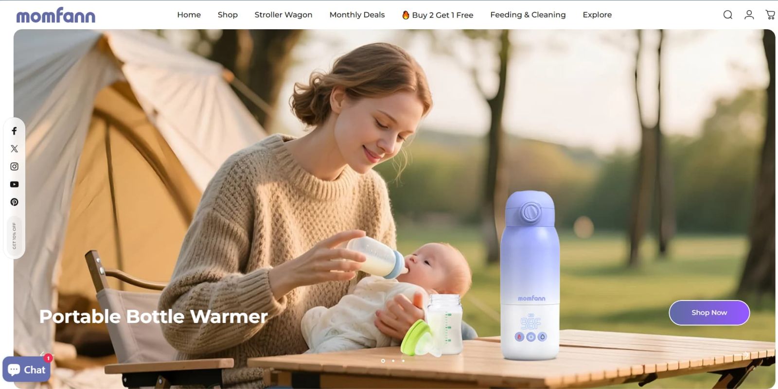Momfann homepage hero showing a parent feeding a baby outdoors next to the portable bottle warmer